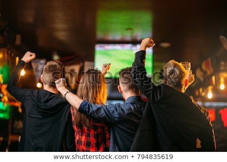 Stok fotoğraf: Friends Or Football Fans Watching Soccer