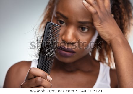 Stockfoto: Worried Woman Suffering From Hairloss