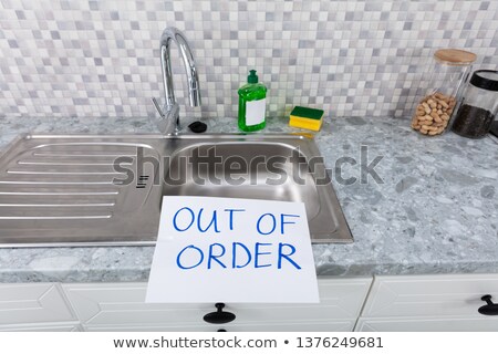 ストックフォト: Out Of Order Text Stuck On Kitchen Sink