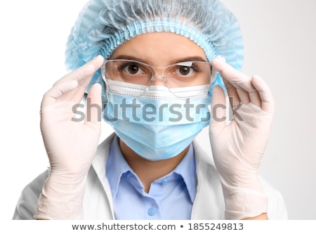Stock fotó: Female Doctor Or Nurse Wearing Goggles Surgical Gloves And Face