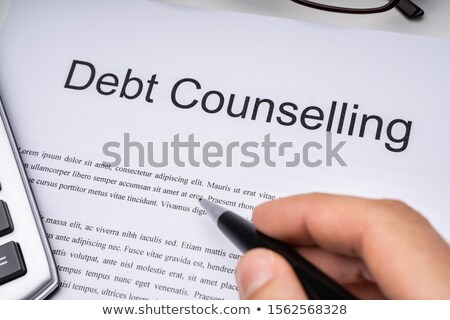 Zdjęcia stock: Person Signing Debt Counseling Form