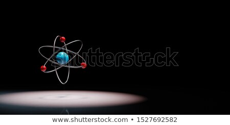 Zdjęcia stock: Atom Symbol Spotlighted On Black Background