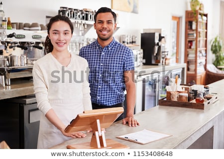 Stock fotó: Young Employees Standing Behind Their Boss