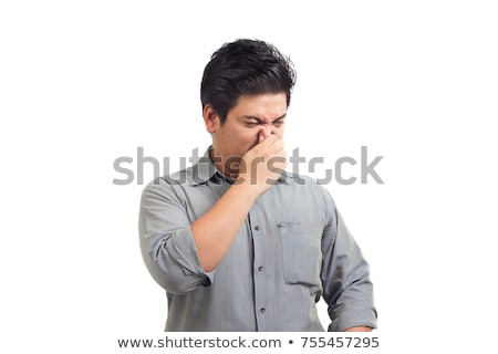 Zdjęcia stock: Man Pinching Nose In Disgust