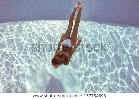 [[stock_photo]]: Underwater Woman Portrait In Swimming Pool