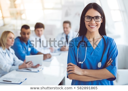 Foto stock: Female Medical Doctor Working