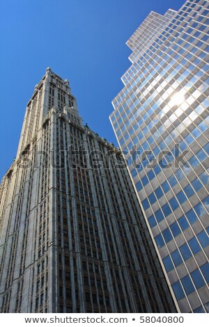 Stock fotó: Facade Of Skyscraper In New York Under Blue Sky