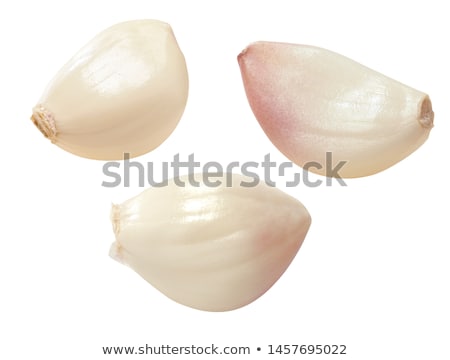 Foto stock: Three Peeled Garlic Cloves