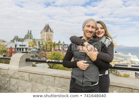 Foto stock: Couple In Front Of Chateau Frontenac At Quebec City Canada