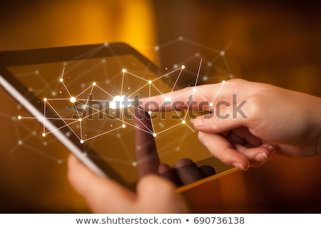 Stockfoto: Finger Touching Tablet With Web Technology Icons Concept