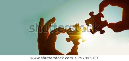 Stock photo: Businessman On Puzzle Piece