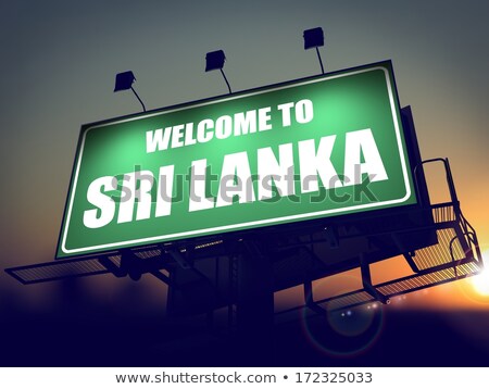 Stok fotoğraf: Billboard Welcome To Sri Lanka At Sunrise