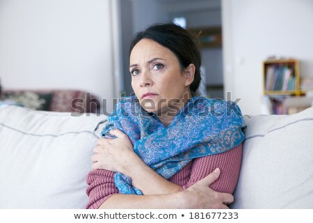 ストックフォト: Mature Woman Shivering In Cold