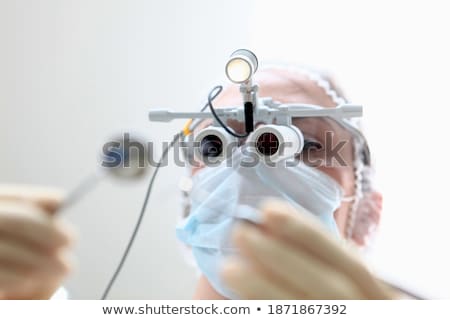 Stock photo: Dentist Doctor Holding Brush And Mirror