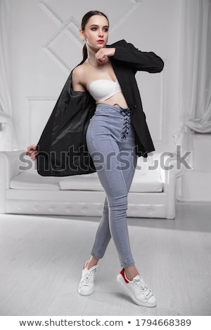 Foto stock: Seductive Women In White Bras And Jeans