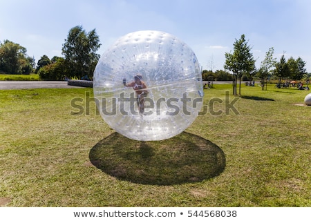 Stock photo: Cute Child Has A Lot Of Fun In The Zorbing Ball