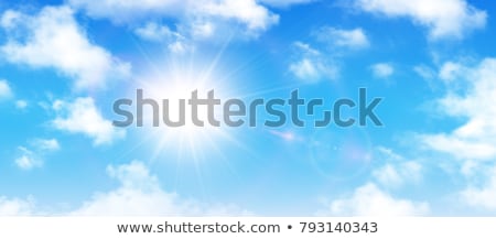 ストックフォト: Sun On Blue Sky With White Clouds