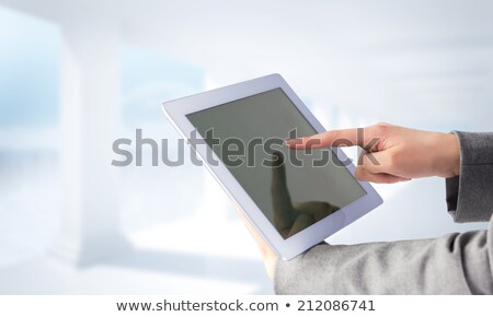 Zdjęcia stock: Composite Image Of Businesswoman Using A Tablet