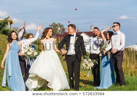 Stock fotó: Fabulous Young Woman In The Petals Rain