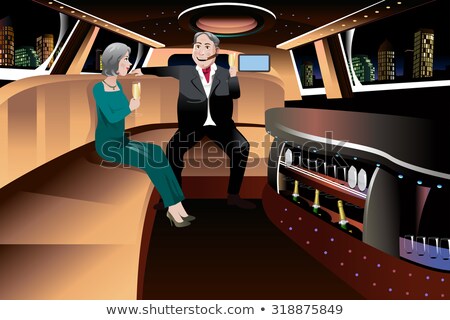 ストックフォト: Jet Set Couple Drinking Champagne