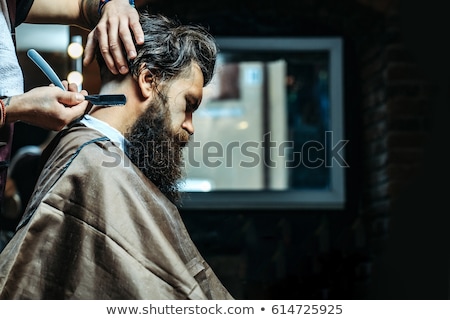 Сток-фото: Image Of Man Getting Beard Haircut At Barbershop