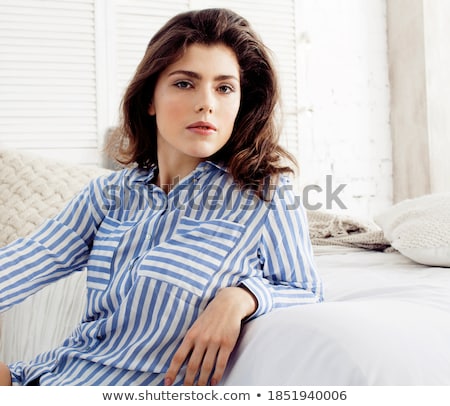 Stock fotó: Young Pretty Brunette Woman In Her Bedroom Sitting At Window Happy Smiling Lifestyle People Concept