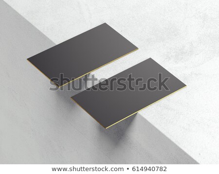 Foto stock: Two Blank Black Business Cards On The Edge 3d Rendering