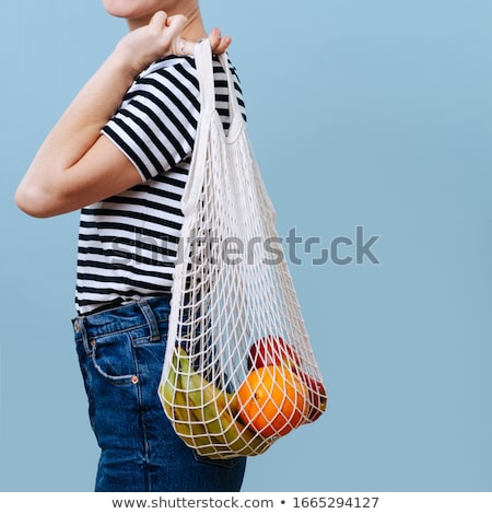 [[stock_photo]]: Side View Of Smiling Ginger Woman In Shirt And Jeans