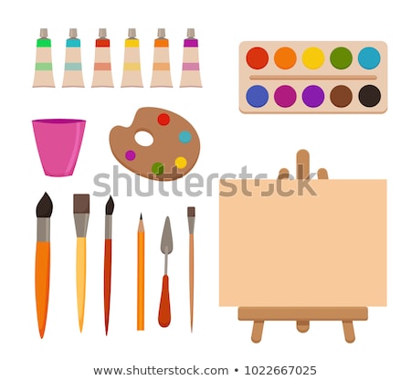 Foto stock: Watercolor Palettes And Paint Brushes Artist Workplace