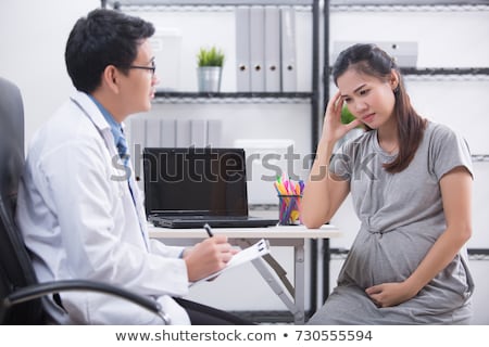 Stock photo: Pregnant Woman Visiting Psychologist Doctor