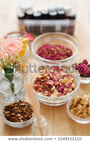 ストックフォト: Glassware With Dry Aromatic Ingredients Spices And Pear Slices On Wooden Table