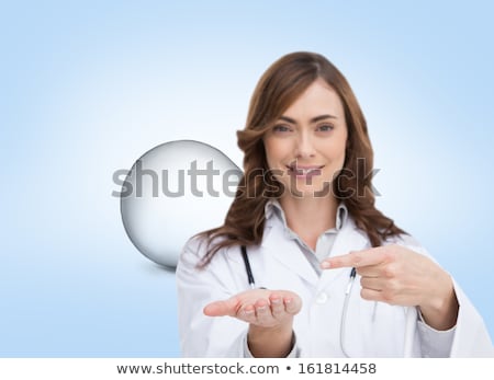 ストックフォト: Attractive Female Doctor Pointing Her Finger