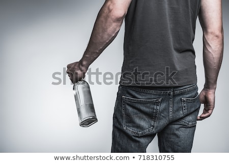 Stock photo: Adult Man Holding An Alcoholic Drink