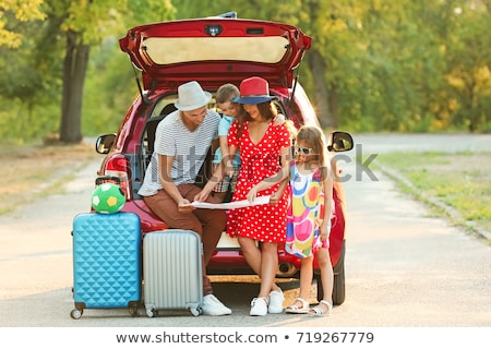 Foto stock: Family Travelling By Car