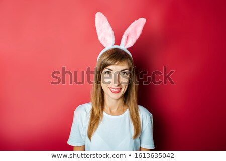[[stock_photo]]: Happy Easter Bunny Girl Looking At Blank Poster