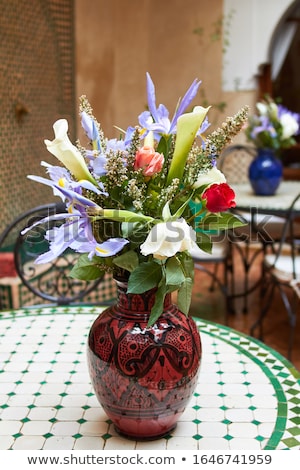 ストックフォト: Courtyard With Flowers Decorated And Old Well