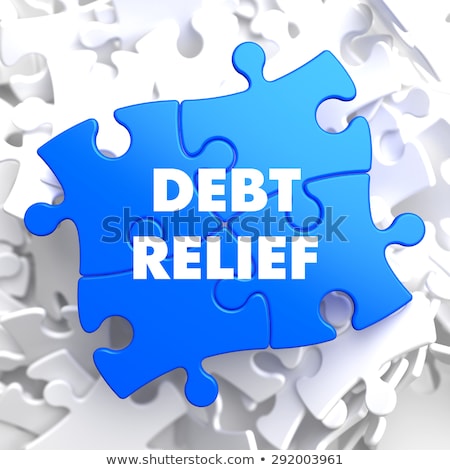 Stock fotó: Debt Relief On Blue Puzzle