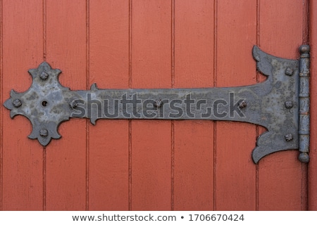Foto stock: Door Hinges Of An Old Wooden Outdoor Building