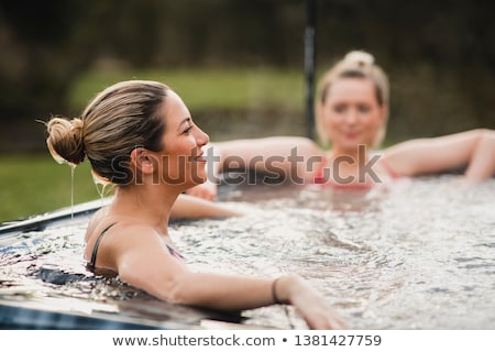 ストックフォト: Beautiful Woman Relaxing In Hot Tub