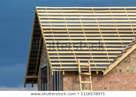 Stockfoto: Close Up Of Two Metal Ladders On A Dark Background