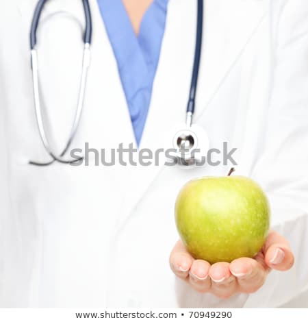 Stock foto: Apple And Stethoscope On A Lab Coat