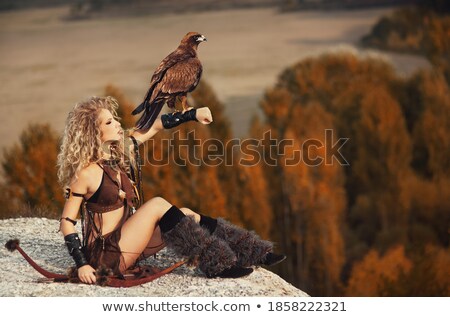 [[stock_photo]]: Blonde Beauty Posing On A Dangerous Rock