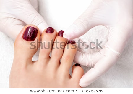 Stok fotoğraf: Woman With Beautiful Red Finger And Toenails