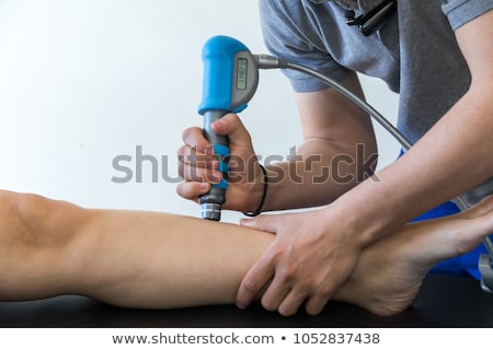 Stockfoto: Shockwave Treatment On Knee