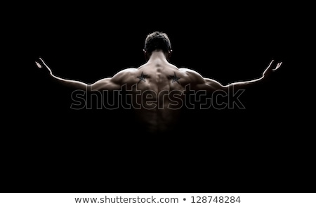 Stockfoto: Rear View Of A Shirtless Bodybuilder