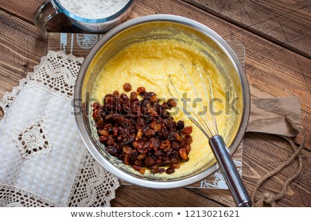 ストックフォト: Sliced Yellow Cake With Raisins On A White Plate