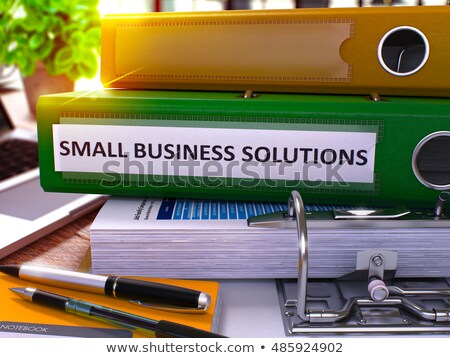 Stockfoto: Green Ring Binder With Inscription Small Business Solutions 3d