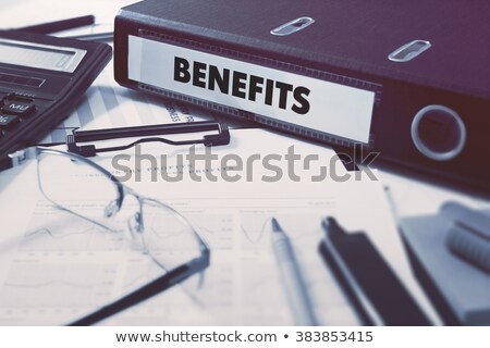 Foto stock: Benefits On Binder Blurred Image