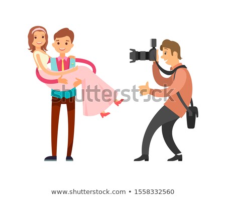 Stok fotoğraf: Photo Reporter Takes Pictures Groom Holding Bride