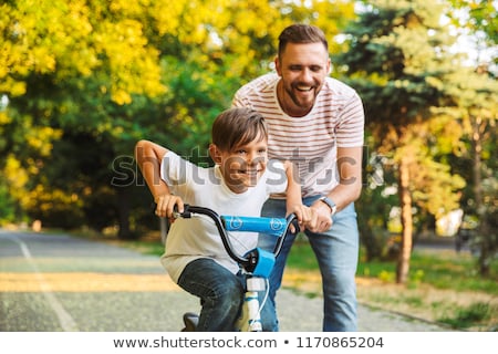Stockfoto: Happy Father And His Son Having Fun